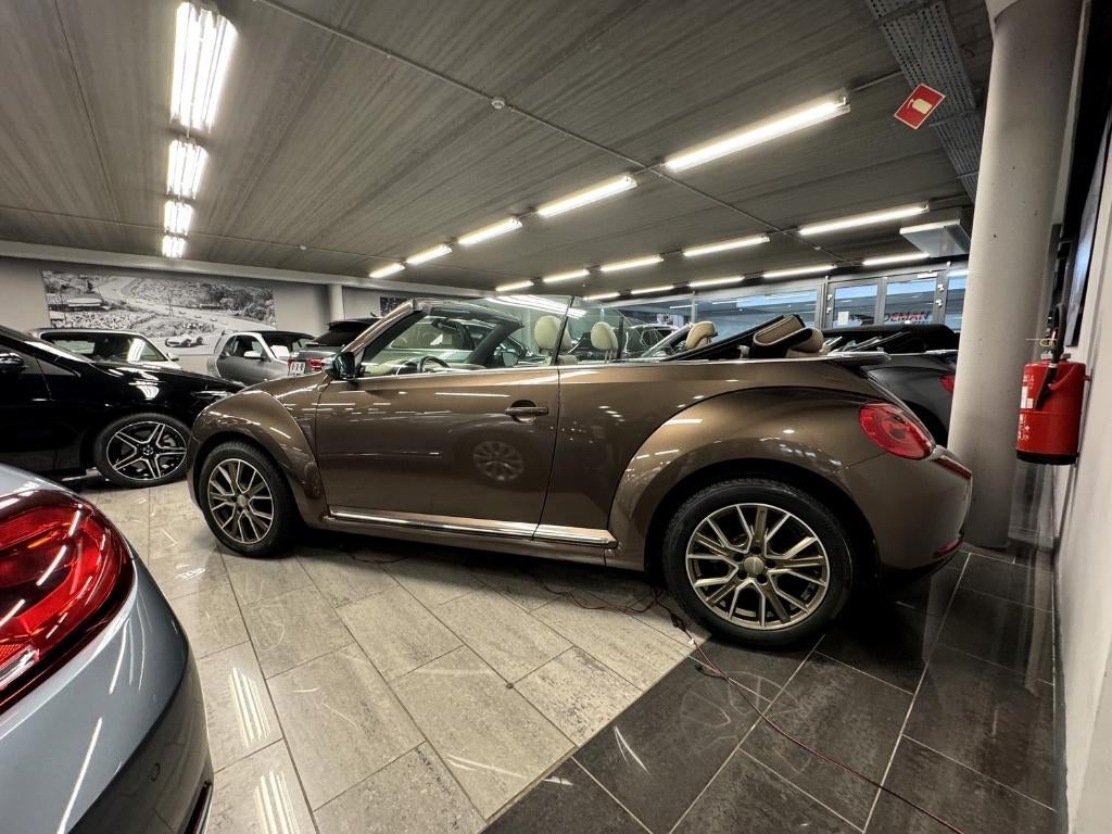 VW New Beetle metallic bruin jaren 70 Cabrio 1.2 TSI, Auto's, Voorwielaandrijving, 4 cilinders, Leder, Bedrijf
