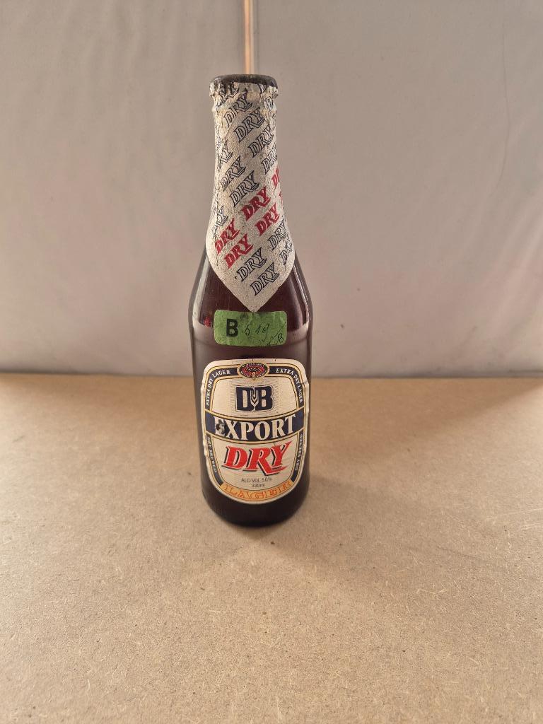 Bouteille de bière DB export dry, Collections, Marques de bière, Enlèvement ou Envoi, Utilisé, Bouteille(s), Autres marques