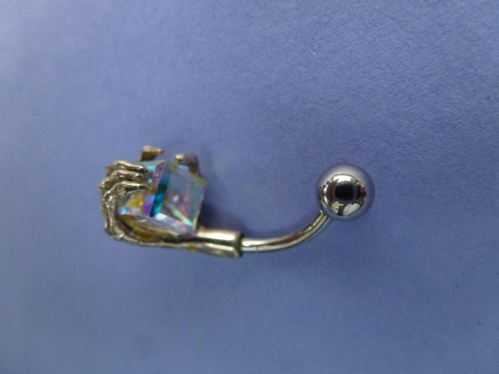 piercing hand met kristal, Handtassen en Accessoires, Piercings, Ophalen of Verzenden, Zo goed als nieuw, Met strass, Overige materialen