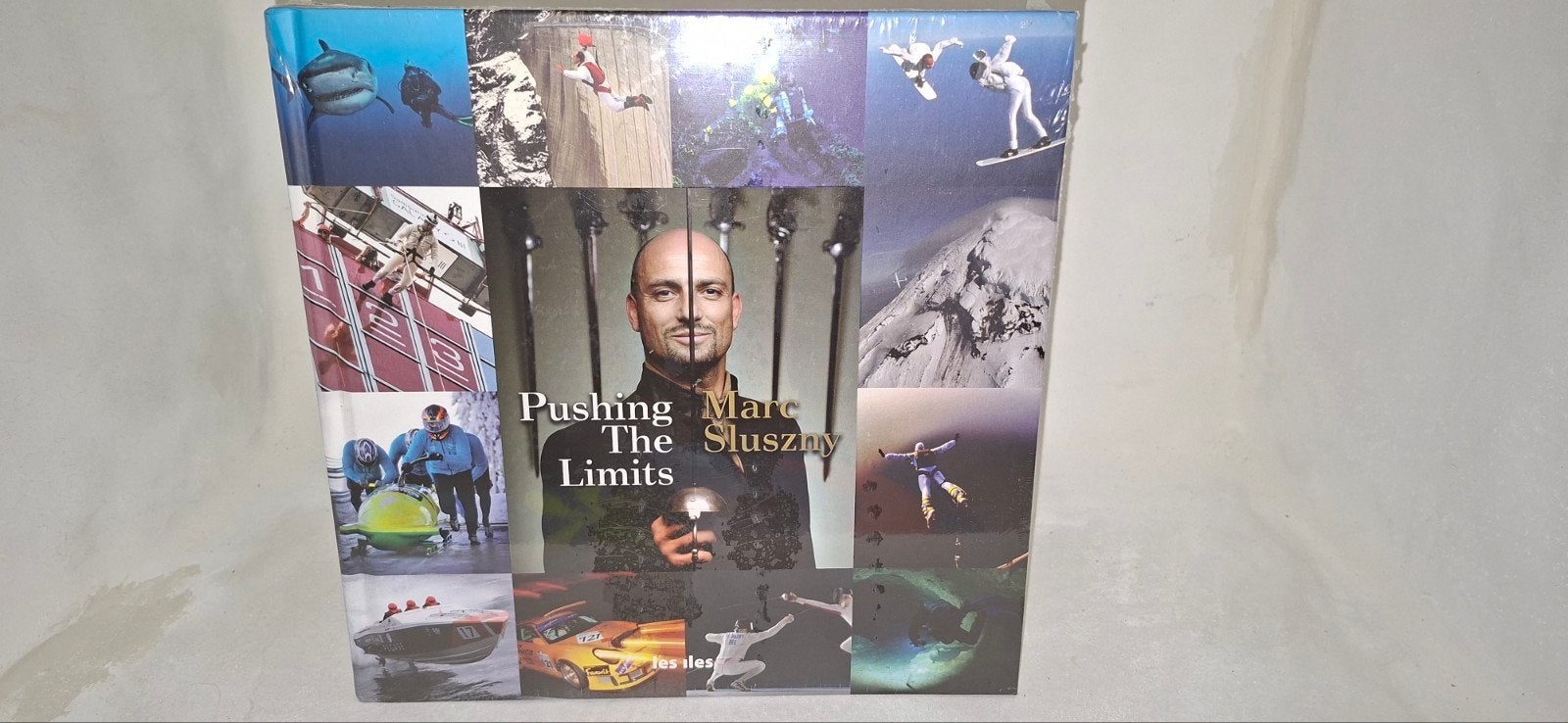 Marc Sluszny - Livre photo de luxe Pushing The Limits (NOUVE, Livres, Biographies, Comme neuf, Sport, Enlèvement ou Envoi