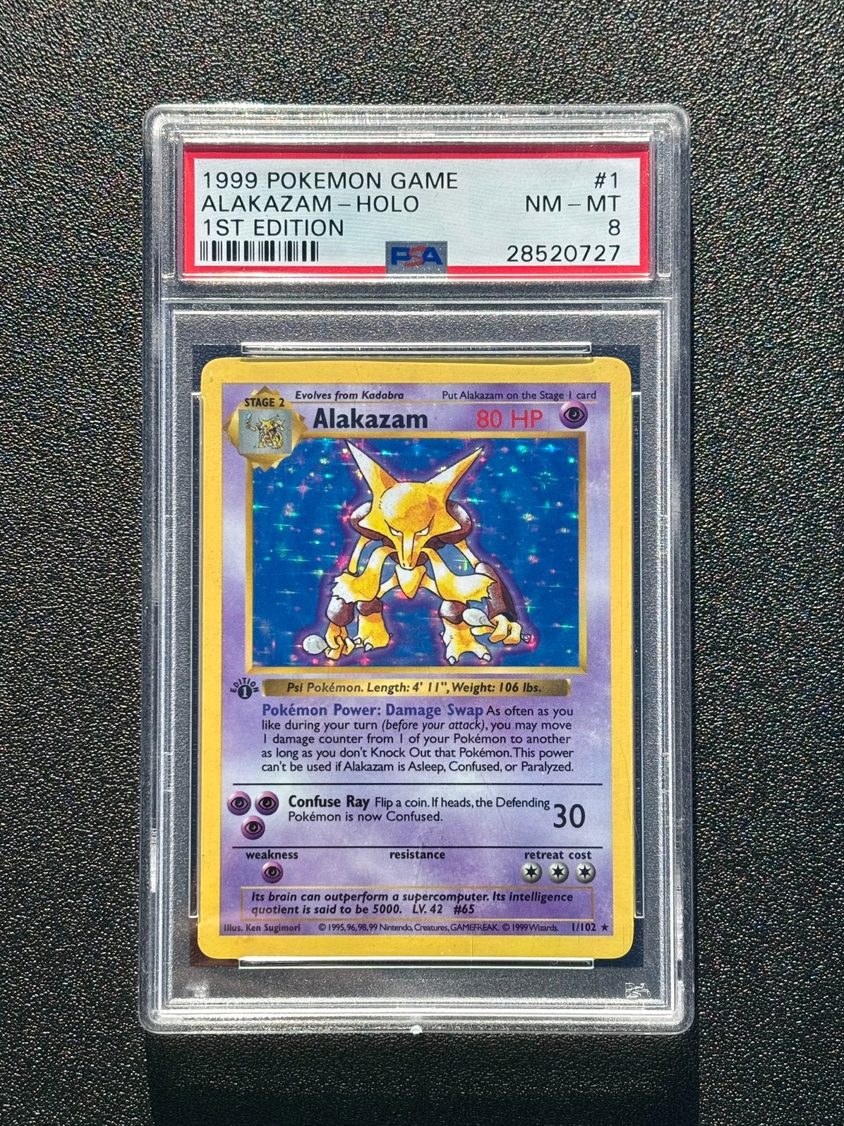 PSA 8 Alakazam Pokémon Base 1999 1st Edition Shadowless Holo, Ophalen of Verzenden, Nieuw, Losse kaart, Foil