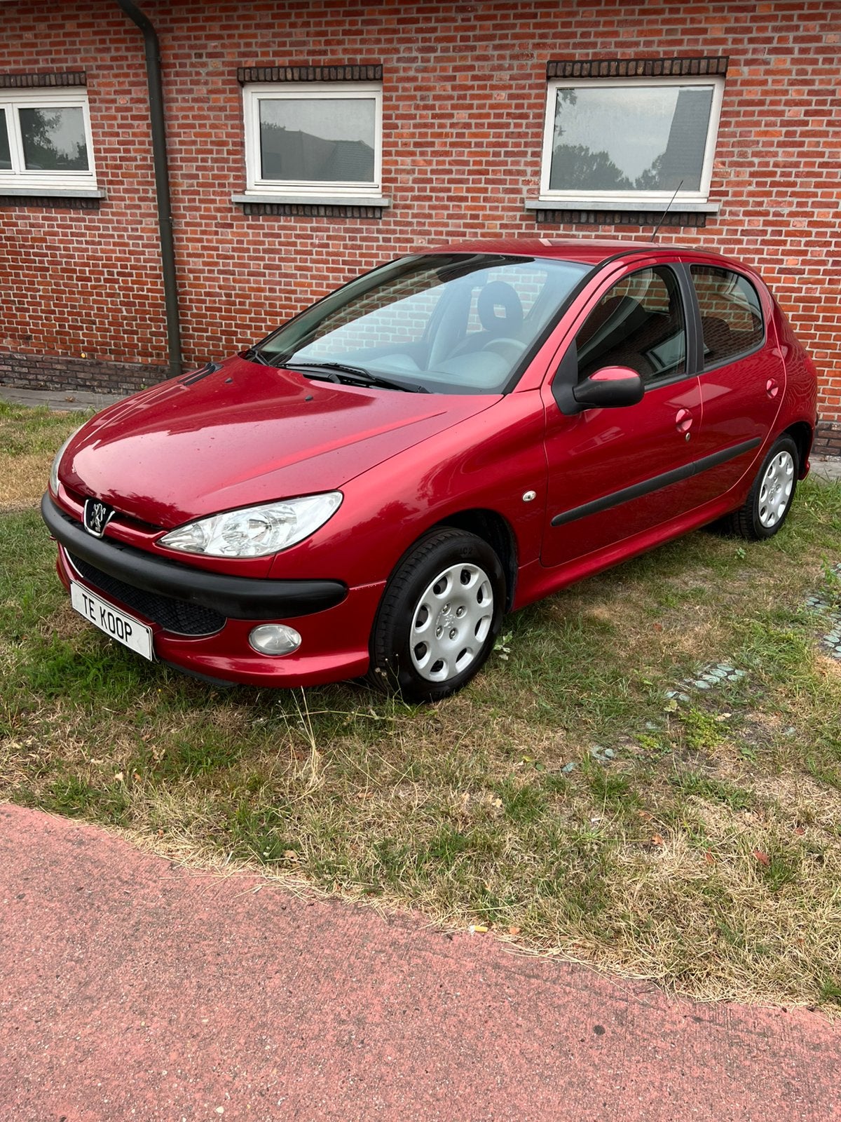 Peugeot 206 1.4i 2007 5deurs met airco 103400km, Rouge, Rétroviseurs électriques, Achat, Entreprise