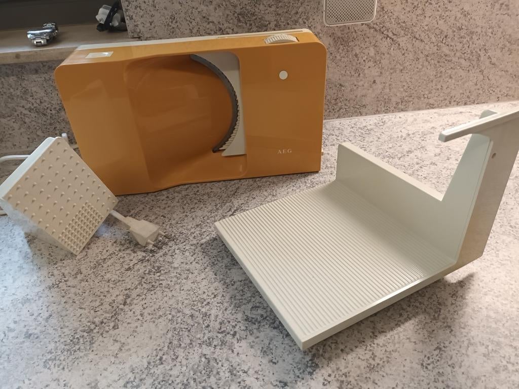 Elektrische brood snijmachine, Ophalen