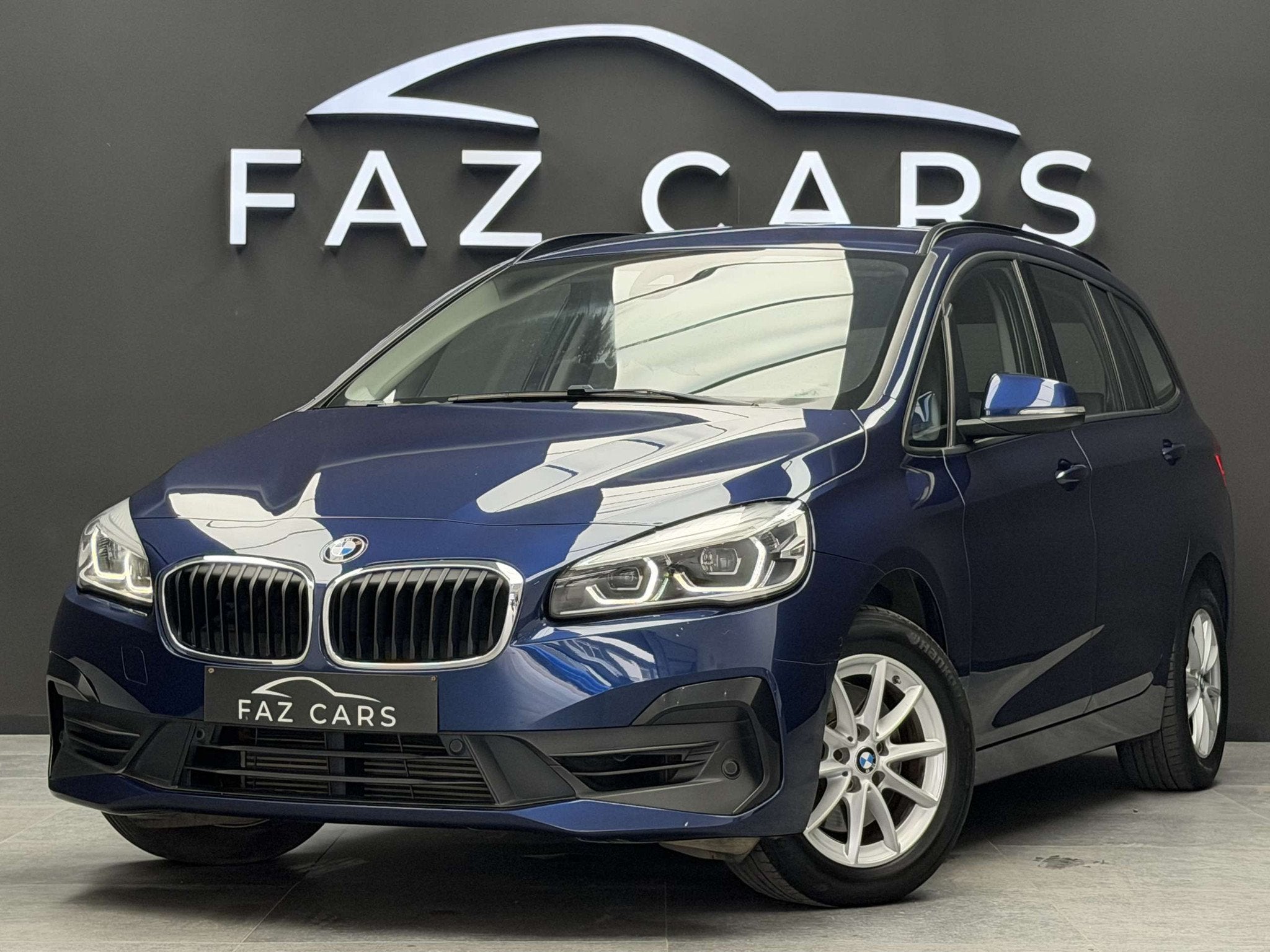 BMW 2 Serie 218 iA Gran Tourer * 1ER PROP + CUIR + GPS + GAR, Gebruikt, Blauw, Leder, Bedrijf