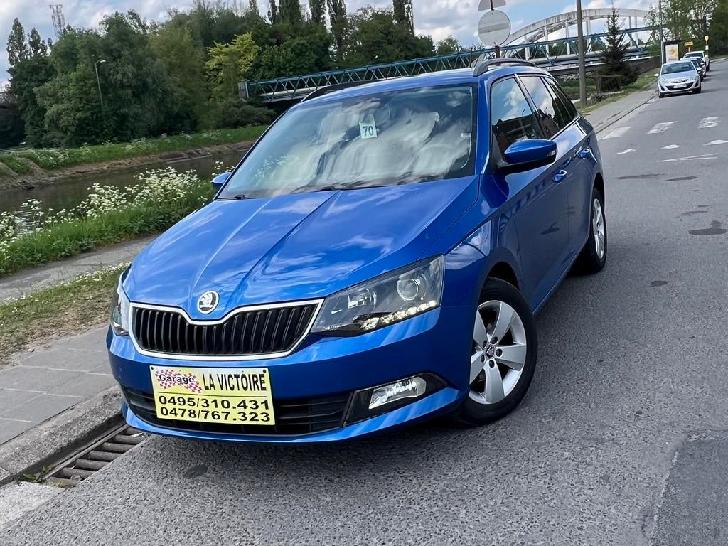 Skoda Fabia Break 1.2 essence 2016 année 66kw 0032478767323, Voorwielaandrijving, Stof, Euro 6, Blauw