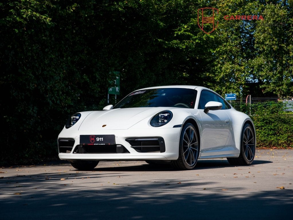 Porsche 911 992 Carrera Coupé 3.0 Carrera / Sport design /, Auto's, Automaat, Gebruikt, Zwart, Automatische klimaatregeling