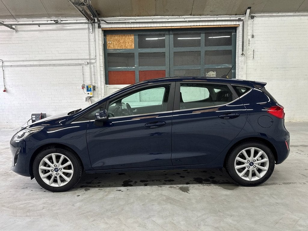 Ford Fiesta 1.0 EcoBoost Titanium | Carplay | Navi | NAP | N, Voorwielaandrijving, Stof, Gebruikt, 580 kg
