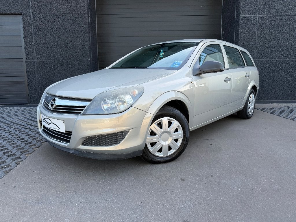 Opel astra 1.4 benzine | airco | break | 12 maand garantie, Autos, Opel, Argent ou Gris, Entreprise, 5 portes, Tissu