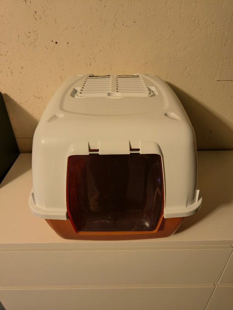 Kattenbak, oranje kleur, Ophalen