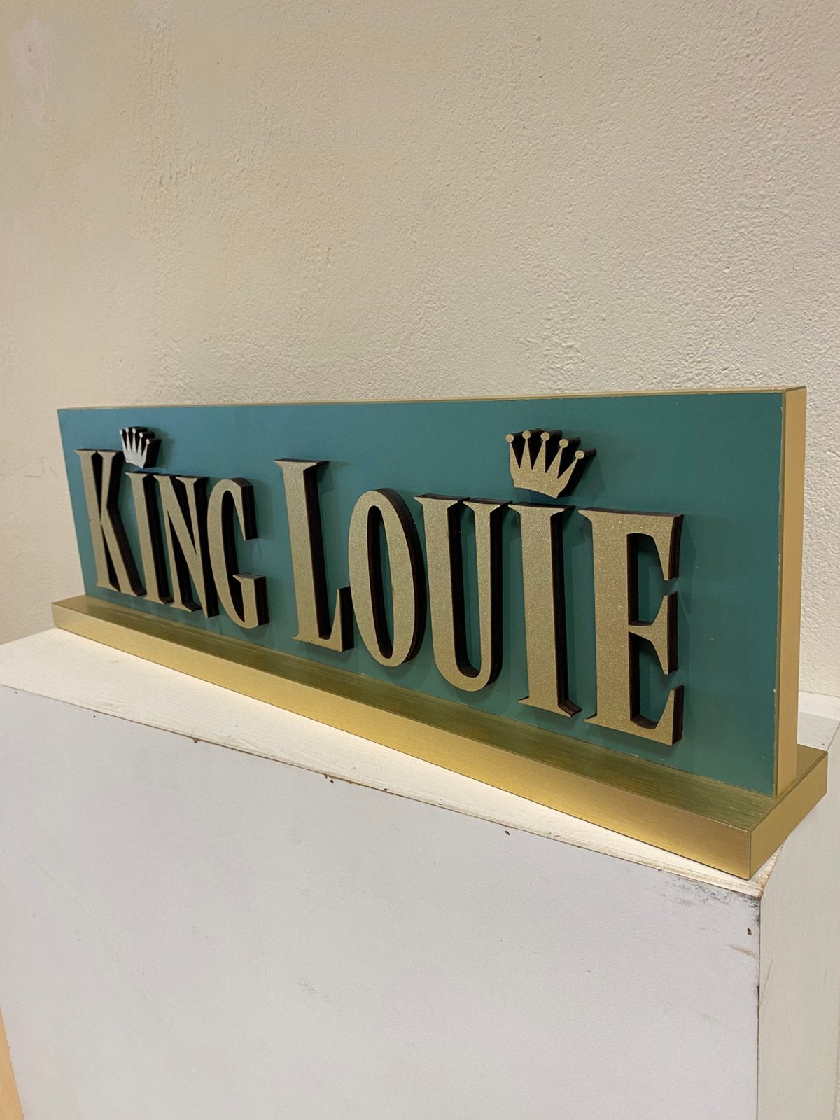 Logo kledingmerk King Louie, Articles professionnels, Enlèvement