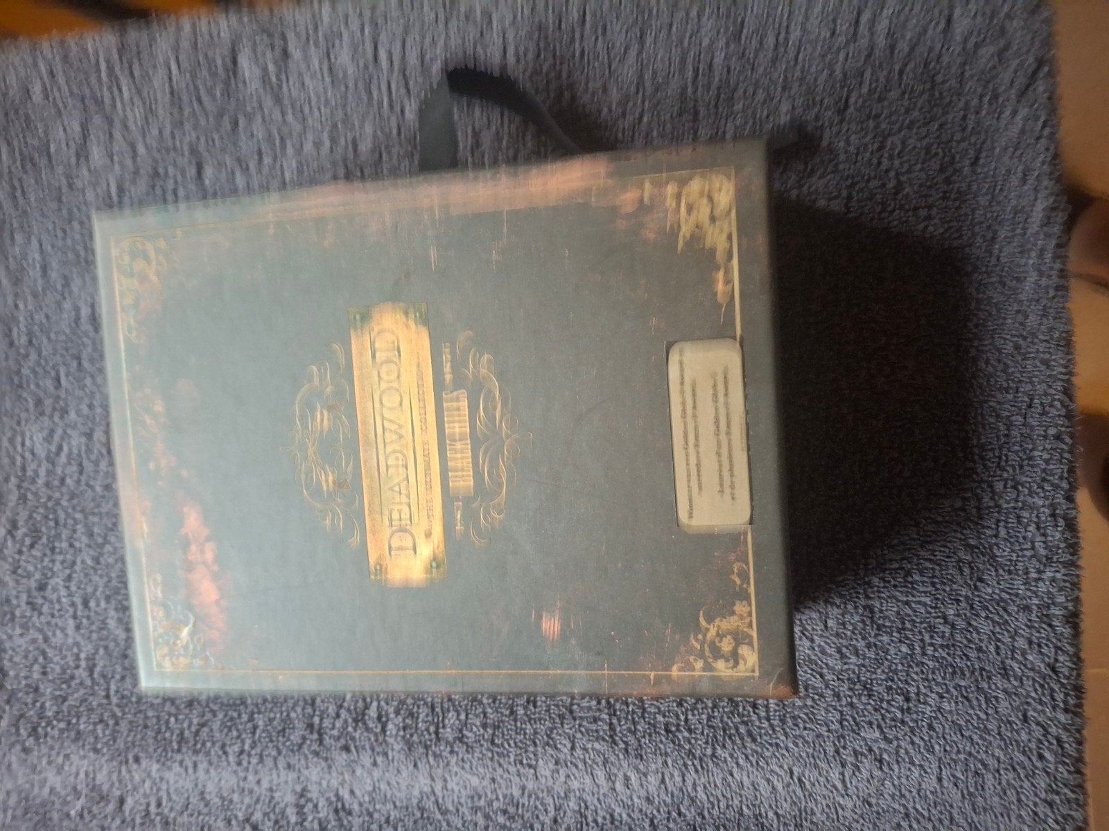 Deadwood, Cd's en Dvd's, Ophalen