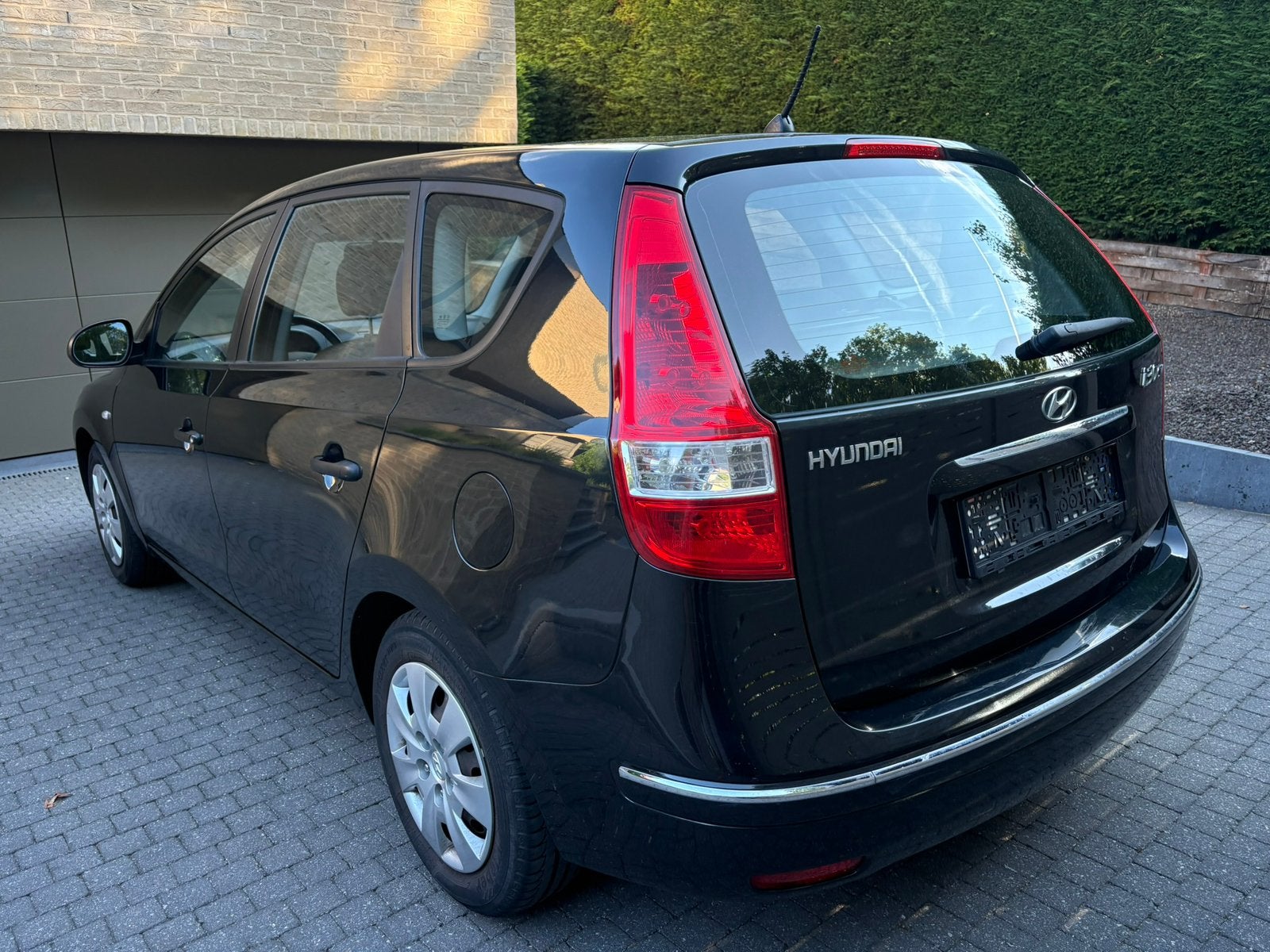 Hyundai i30 stationwagon 1.6 benzine eerste eigenaar, Auto's, Stof, 1599 cc, 4 cilinders, Zwart