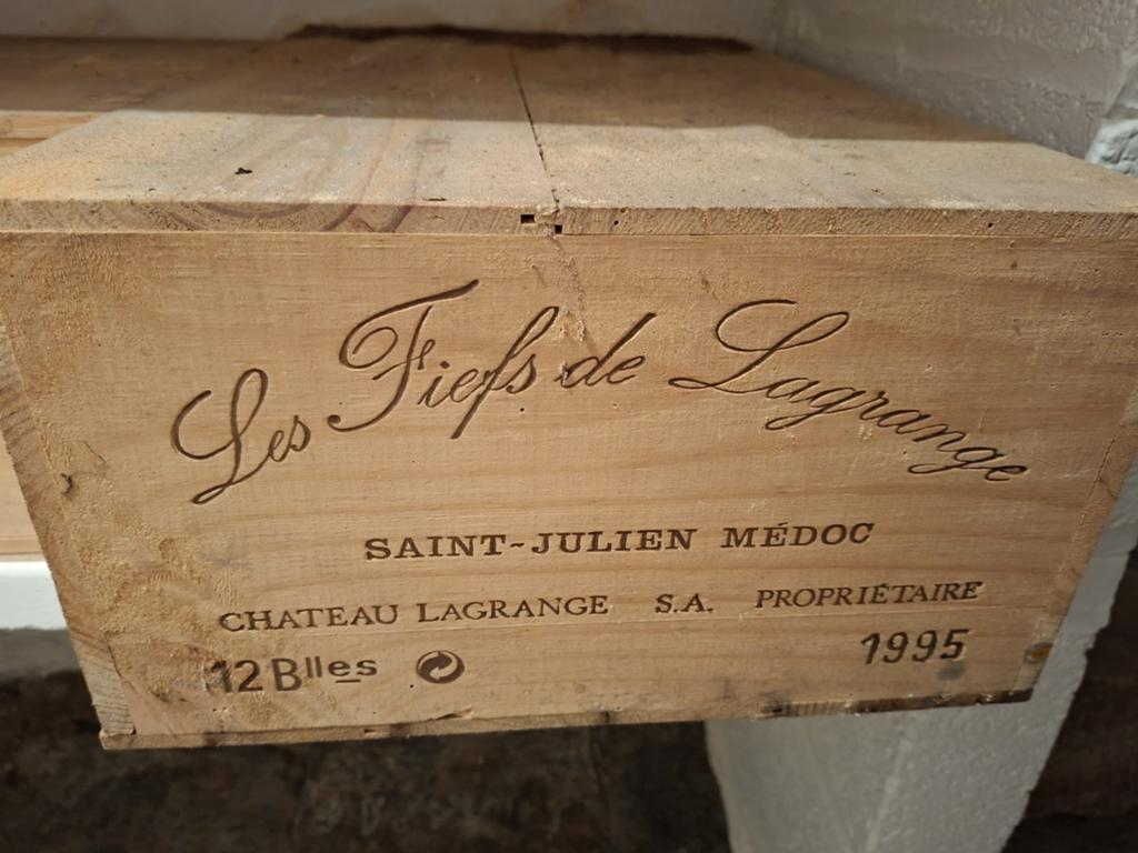 12 bouteilles de Les Fiefs de Lagrange 1995, Enlèvement