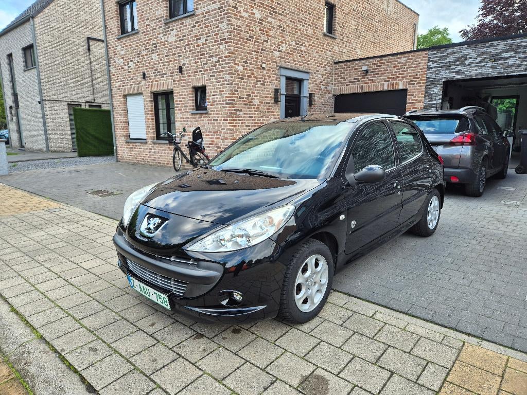 Peugeot 206+ 1.1benzine BJ2012 110.000kms AC 5deurs, Auto's, Peugeot, Voorwielaandrijving, Stof, Zwart, 4 cilinders