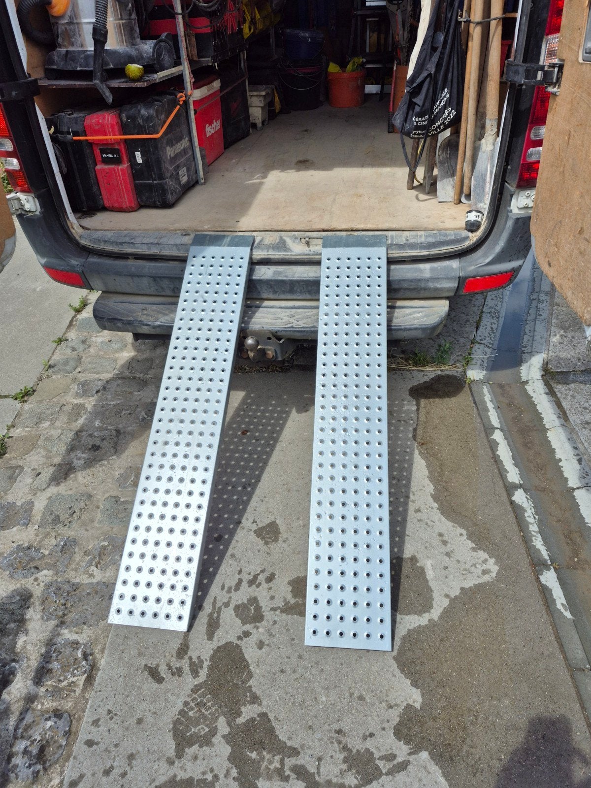 Oprijplaat voor remorque of camionette, Ophalen