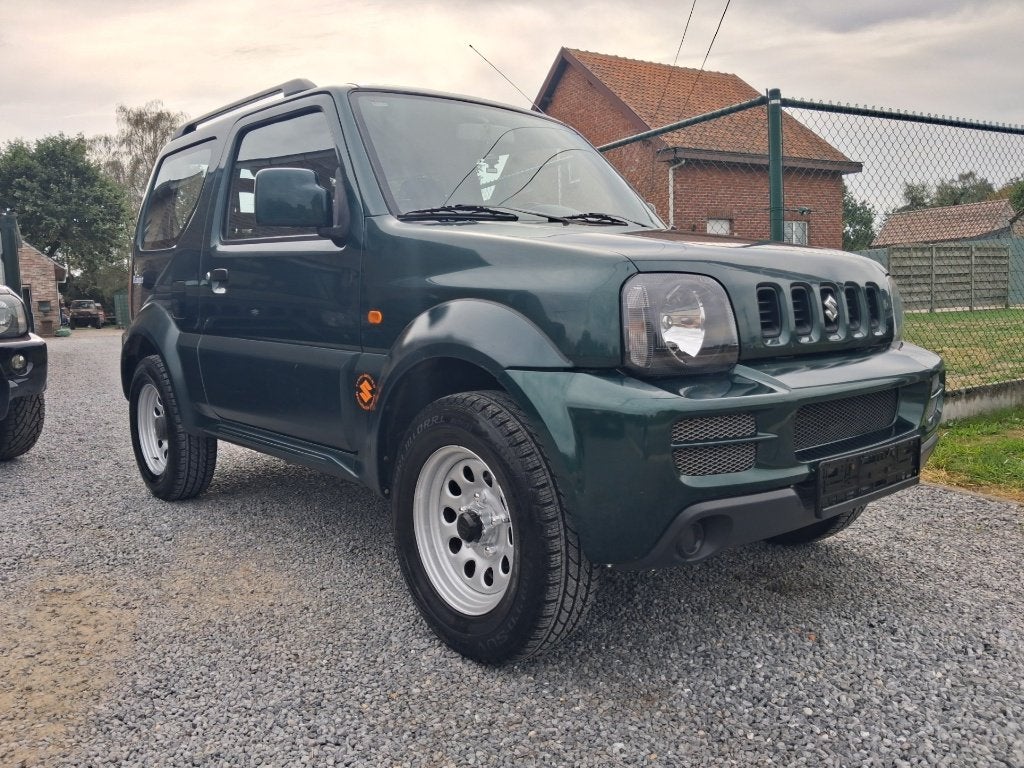 suzuki jimny #4x4# 1300cc benzine !!ranger!! 115 000km, Auto's, 4 zetels, Stof, Zwart, Bedrijf