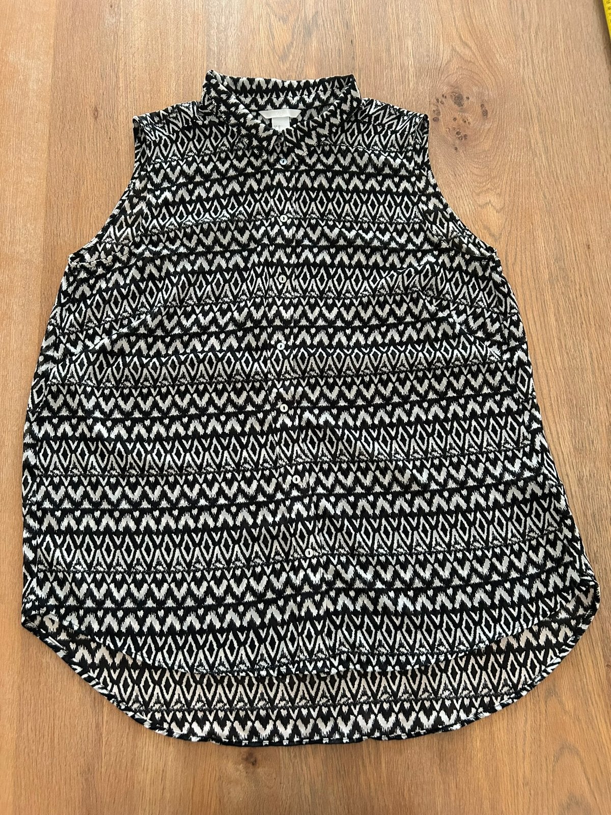 Zwart witte blouse zonder mouwen H&M maat 42, Ophalen of Verzenden, Zo goed als nieuw, Maat 42/44 (L), Zwart