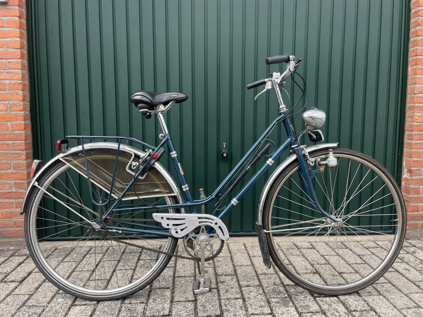 Oude damesfiets, Ophalen