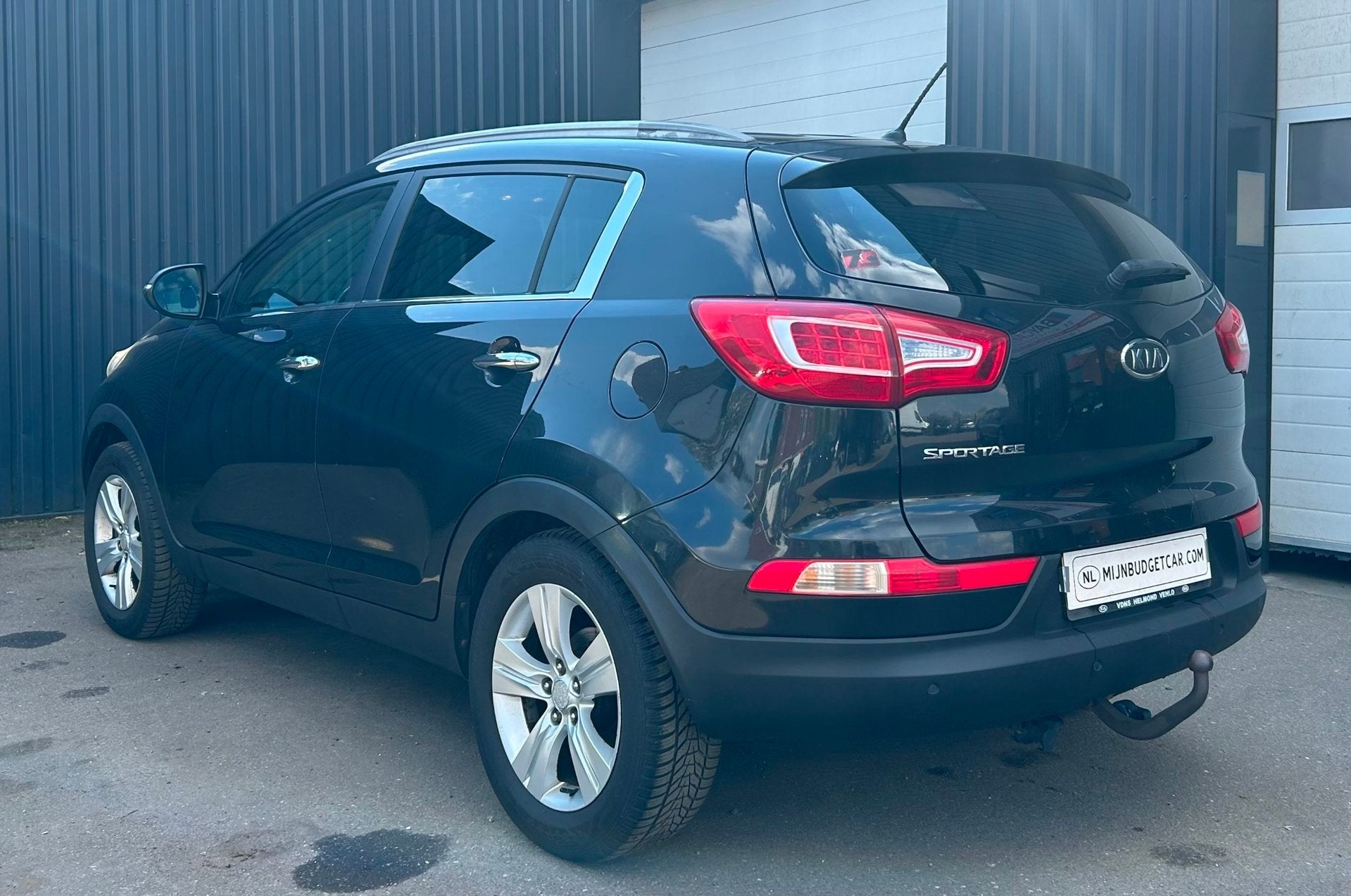 Kia Sportage 2.0 X-ecutive Plus Pack, Auto's, Gebruikt, 4 cilinders, Leder en Stof, Zwart
