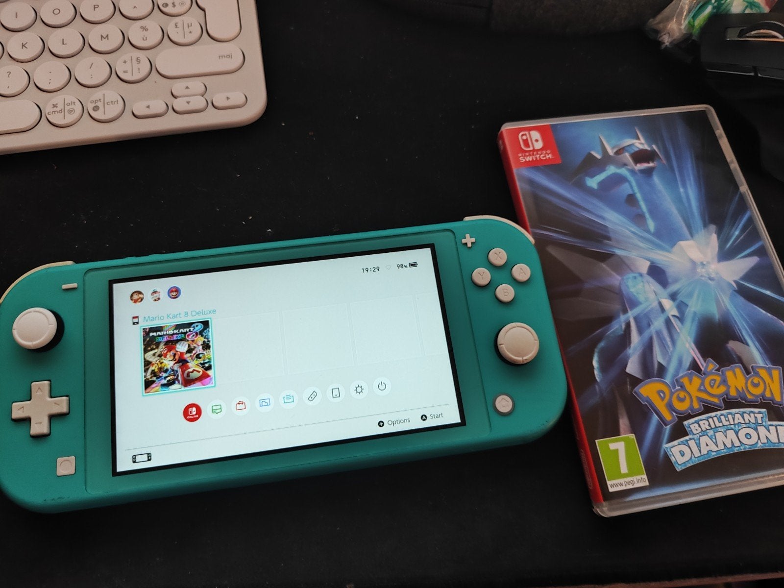 Nintendo Switch Lite + Pokemon en Mario, Ophalen, Turquoise, Zo goed als nieuw