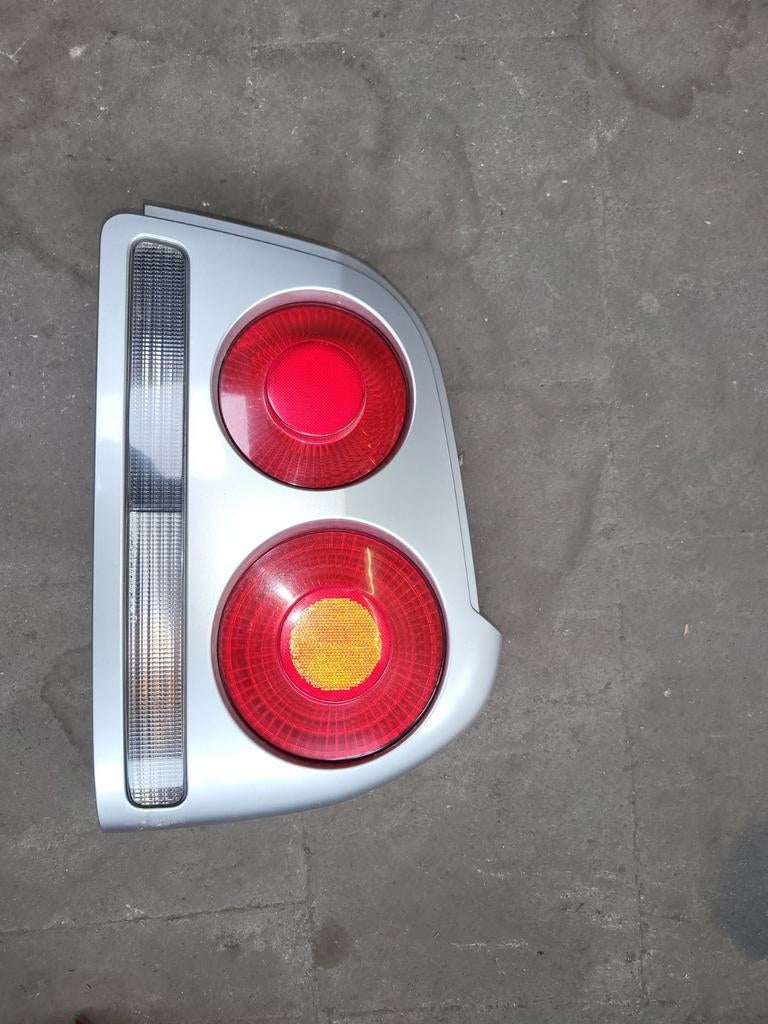 Nissan skyline r34 4 deurs achterlicht, Auto-onderdelen, Ophalen of Verzenden, Gebruikt, Nissan