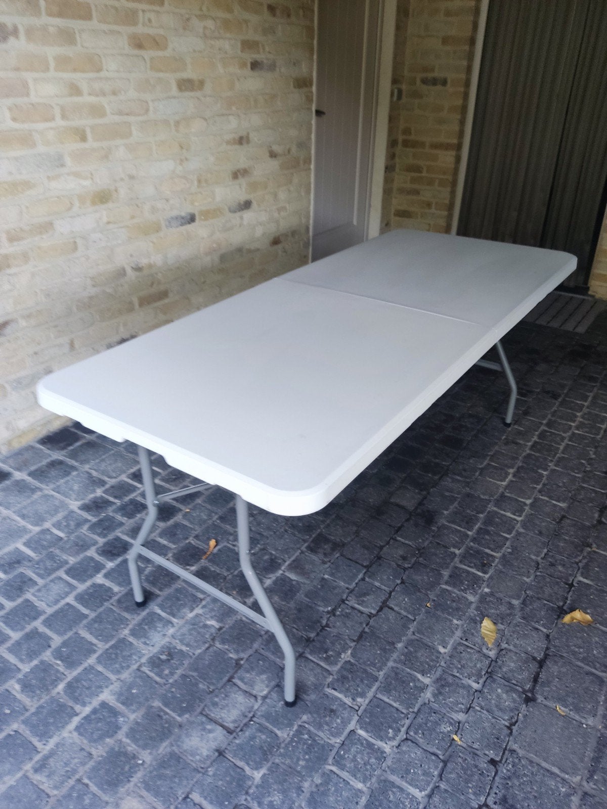 2 partytafels, Ophalen