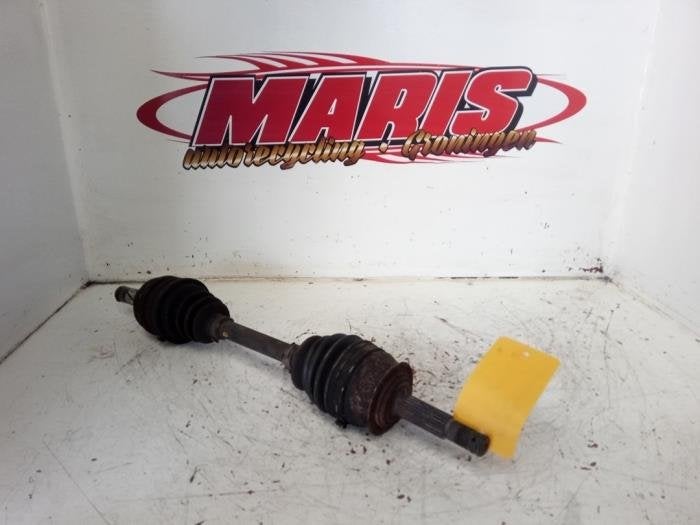 Arbre de transmission avant gauche d'un Opel Corsa, -, -, Opel, 3 mois de garantie