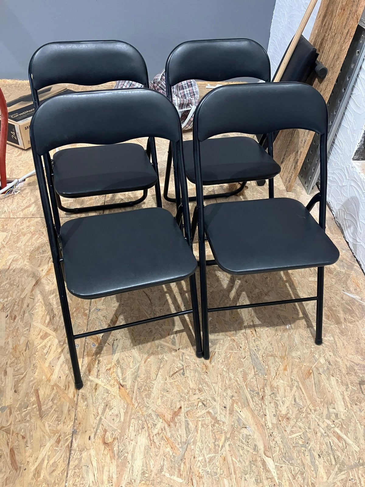 4 plooistoelen met lederlook, Ophalen, Zo goed als nieuw, Zwart