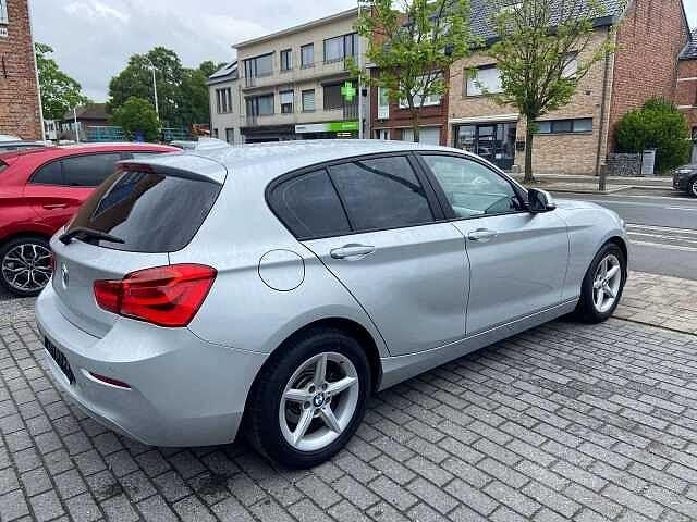 BMW 116 i NAVI ALU AIRCO PDC 66000KM, 1 Reeks, Zwart, https://public.car-pass.be/vhr/802bb7d8-250f-4507-b0d3-fca1c9614b7d, 107 pk
