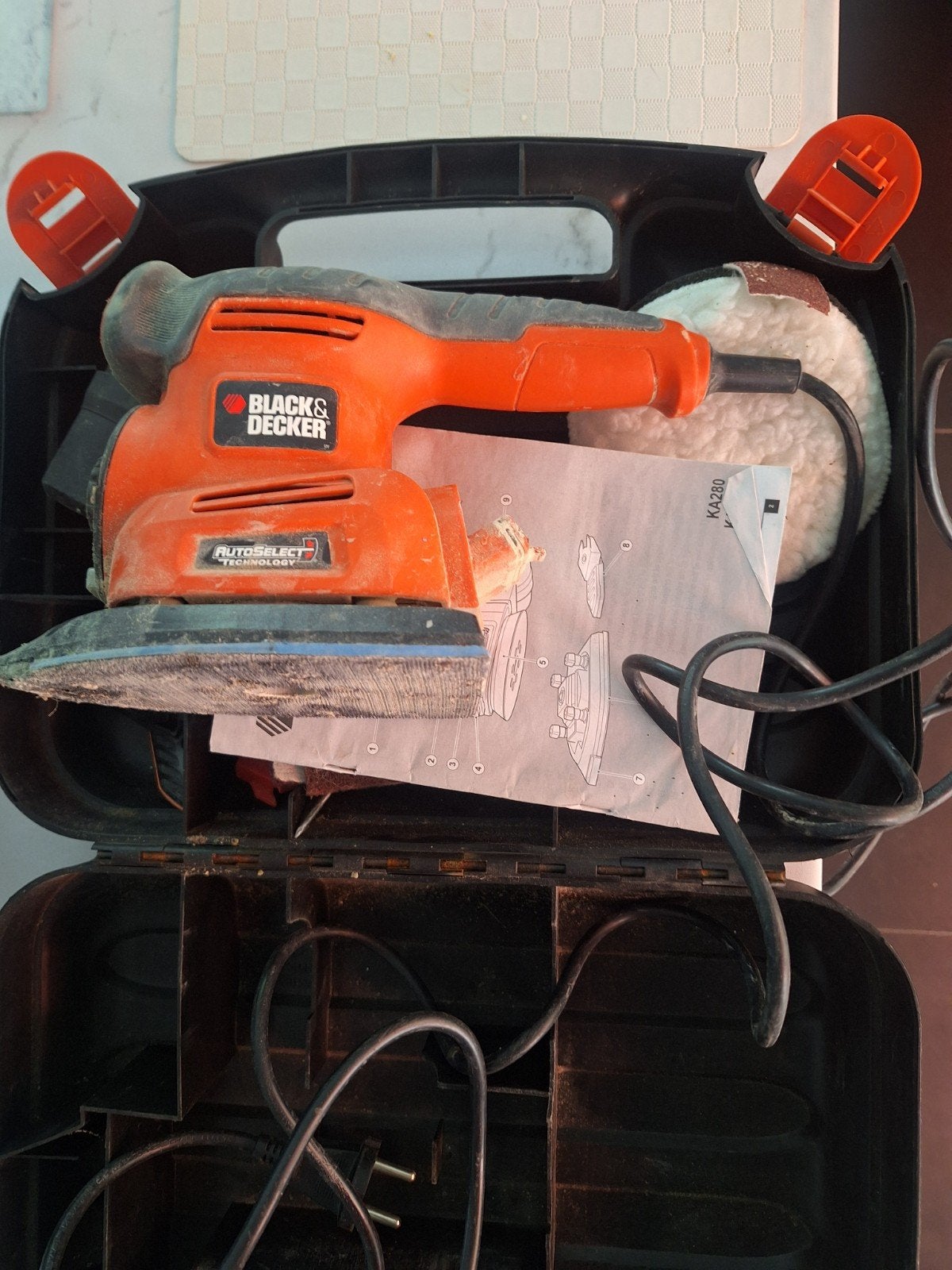 Black-decker schuurmachine, Ophalen