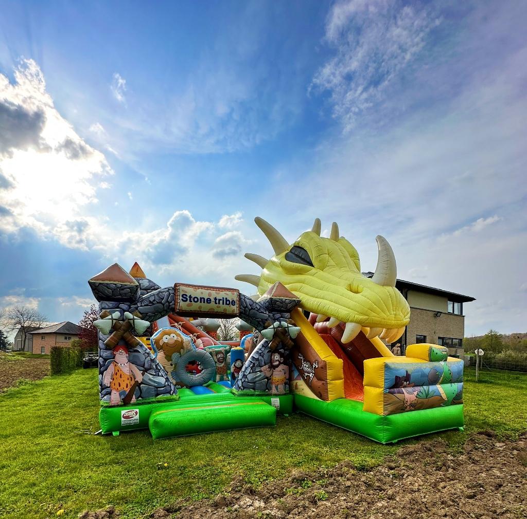 Springkasteel The stone tribe Te huur, Kinderen en Baby's, Speelgoed | Buiten | Springkussens, Zo goed als nieuw, Ophalen