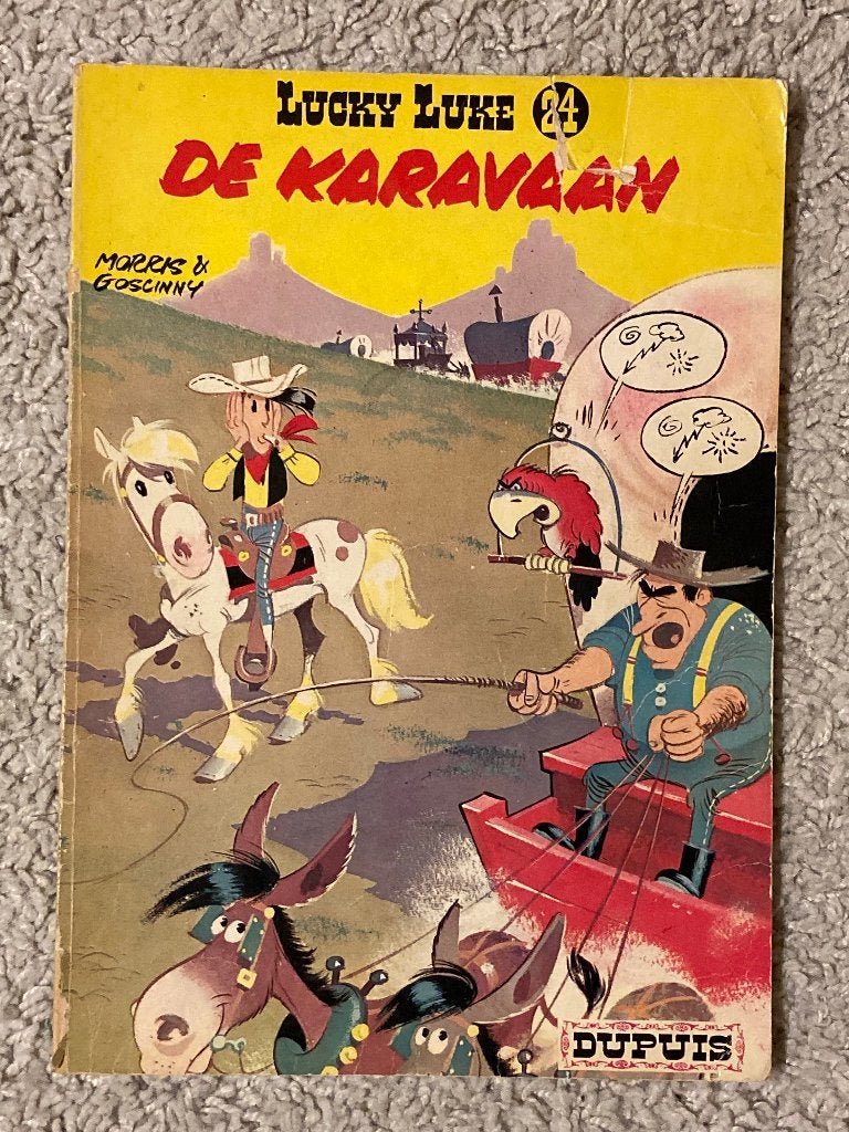 Lucky Luke - Nr. 24 - De Karavaan - Tweede druk, 1966, Boeken, Stripverhalen, Eén stripboek, Ophalen of Verzenden, Gelezen