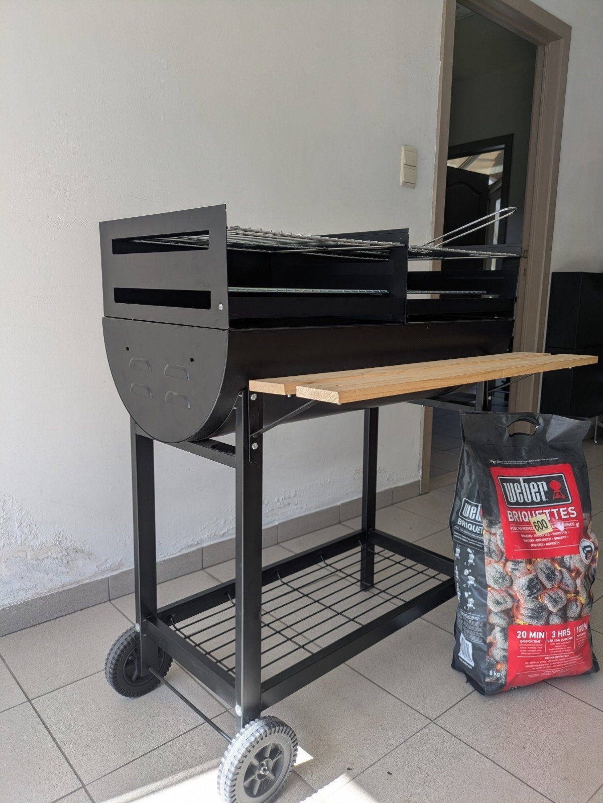 nieuwe BBQ houtskool, Enlèvement