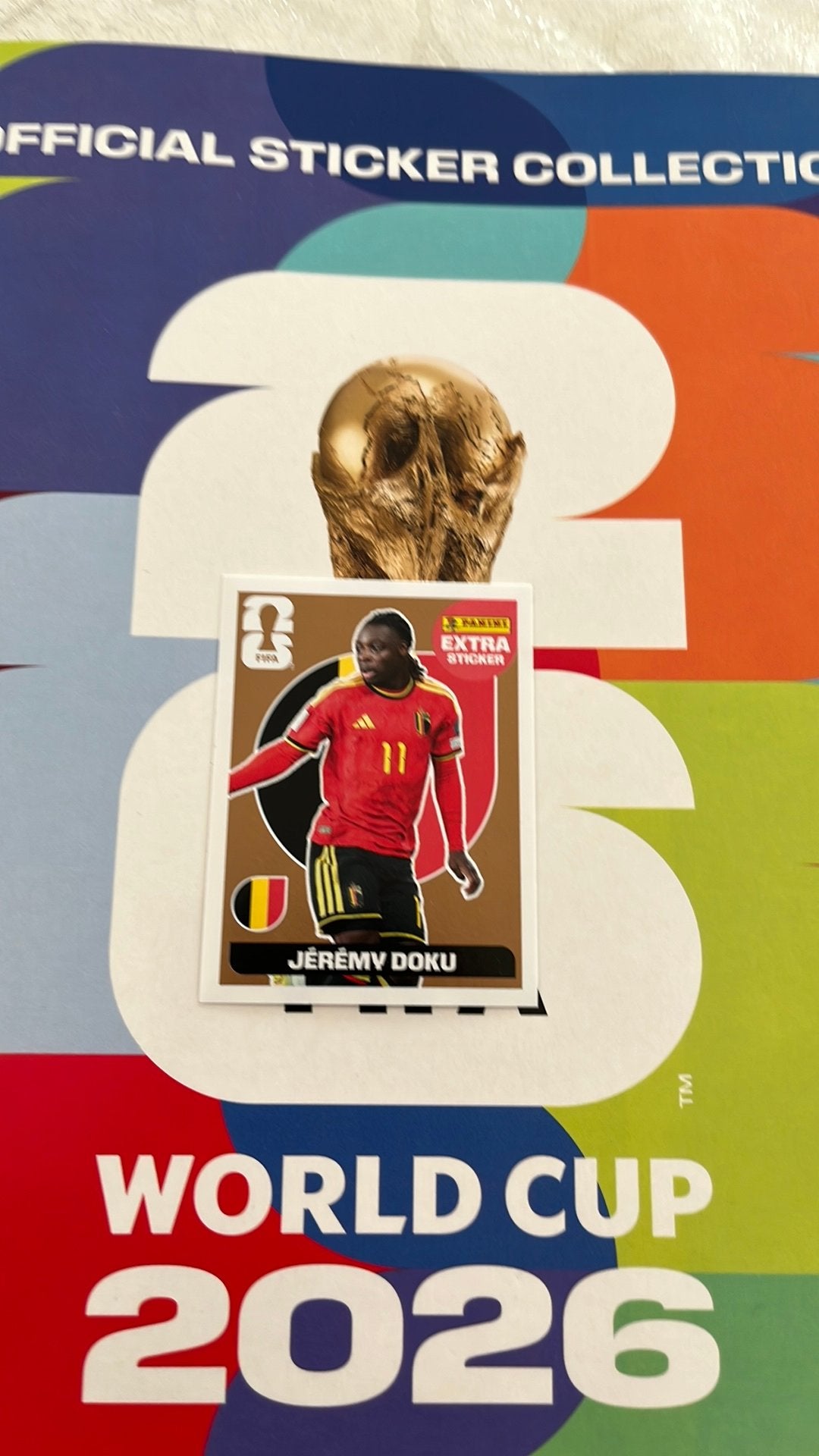 Carte panini Jérémy Doku extra stricker bronze, Enlèvement ou Envoi, Neuf, Autocollant