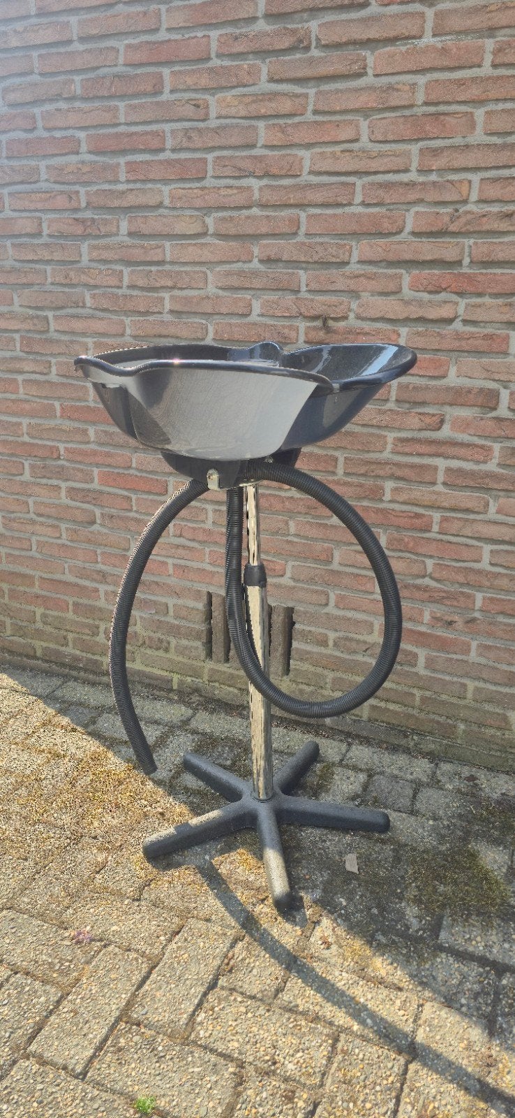 kapperswasbak, Ophalen