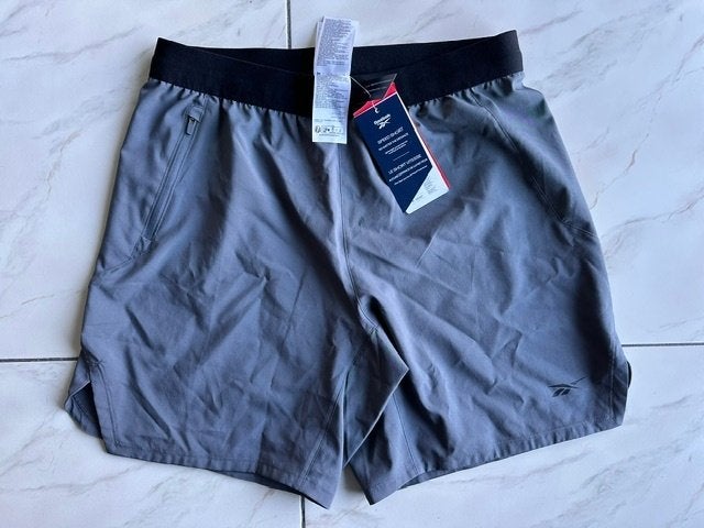 Short avec le label Reebok taille S (nr1920a), Neuf, Gris, Enlèvement ou Envoi, Course à pied ou Cyclisme