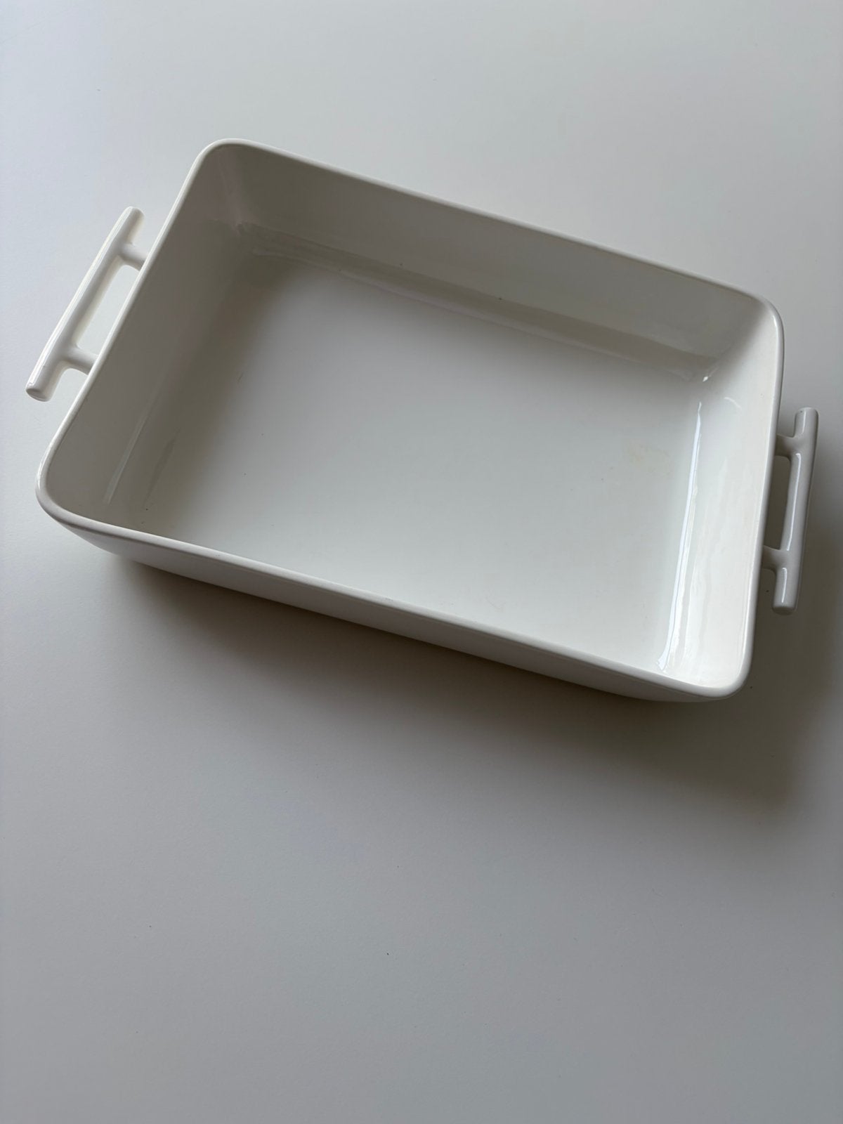 Witte keramische ovenschaal met handgrepen – 24 x 33 cm, Overige typen, Ophalen of Verzenden, Zo goed als nieuw, Steen/keramiek