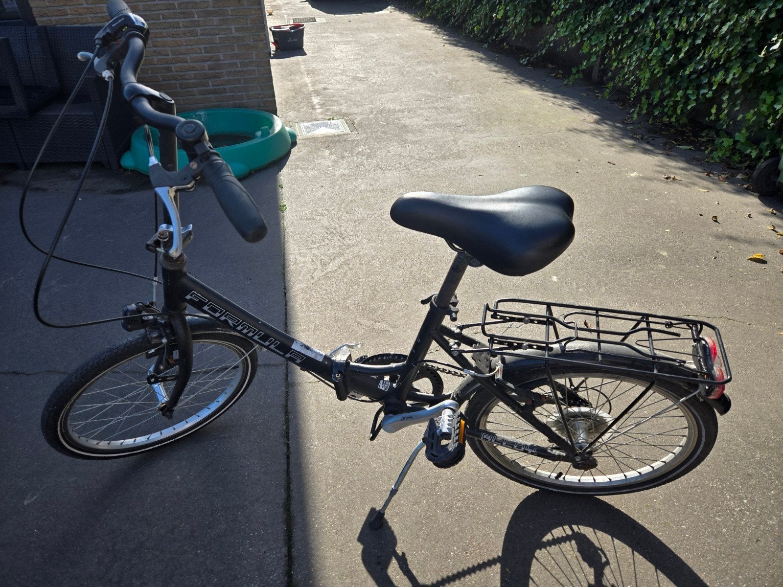 plooifiets mini, Ophalen