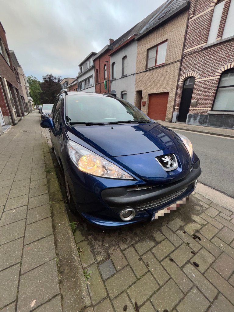 Peugeot 207sw 1.4 16v 95pk 2010 BENZINE (EXPORT), Auto's, Voorwielaandrijving, Stof, Zwart, 4 cilinders