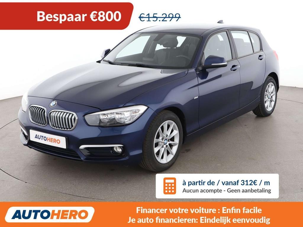 BMW 1 Serie 118 118i Urban Line (bj 2016, automaat), Auto's, Zwart, 5 deurs, 1395 kg, https://public.car-pass.be/vhr/7f595de0-80ab-4b2c-9948-8d951681840e