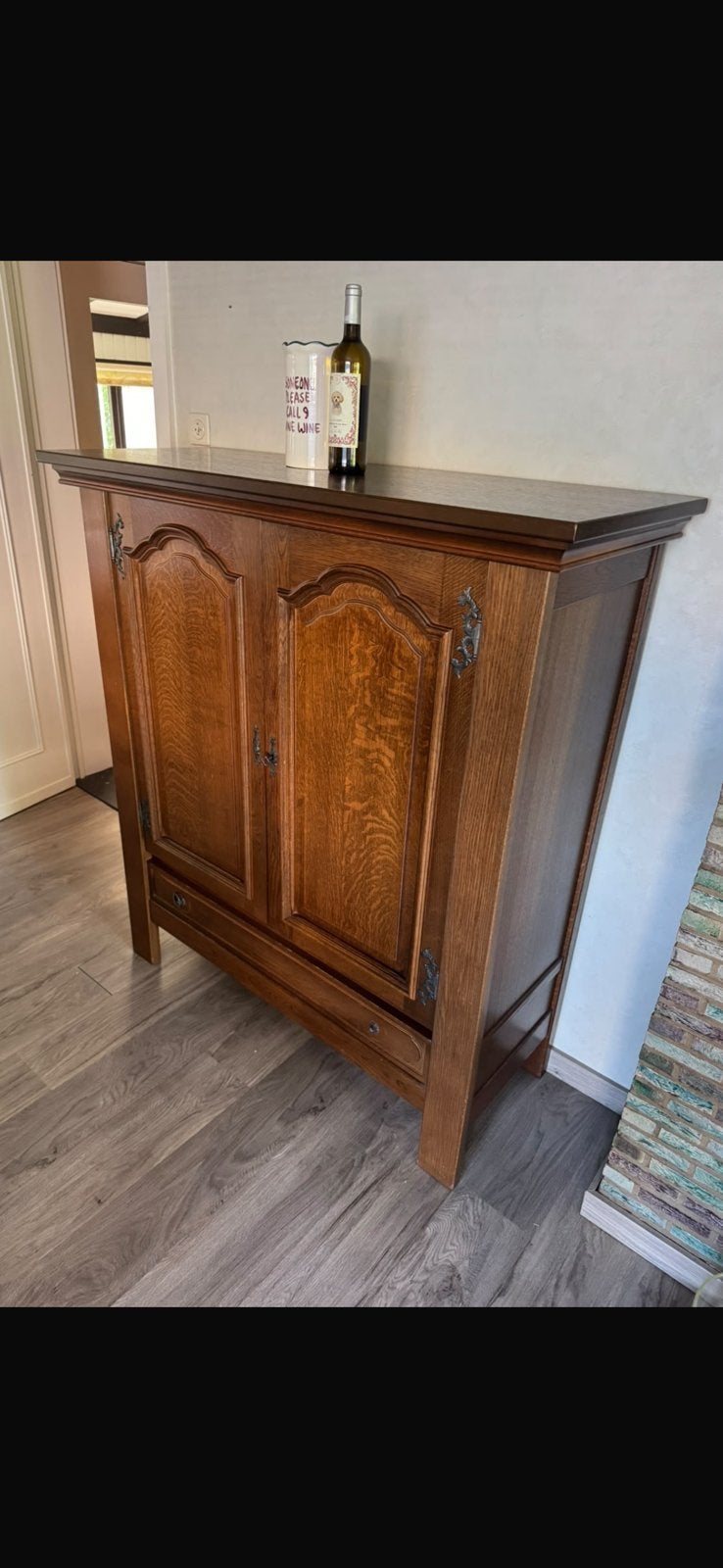 Living kast, Ophalen