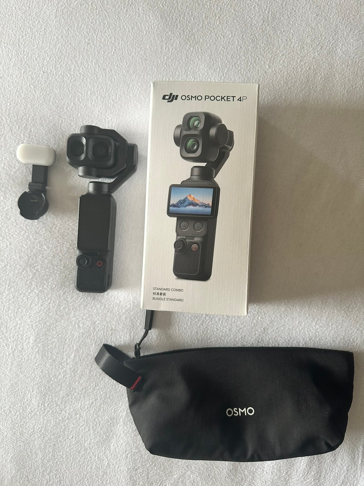 DJI Osmo Pocket 4 Pro – Standard Combo, Ophalen of Verzenden, Zo goed als nieuw, Overige merken