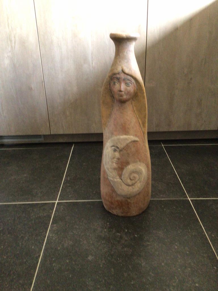 Hoge betonnen pot, Ophalen