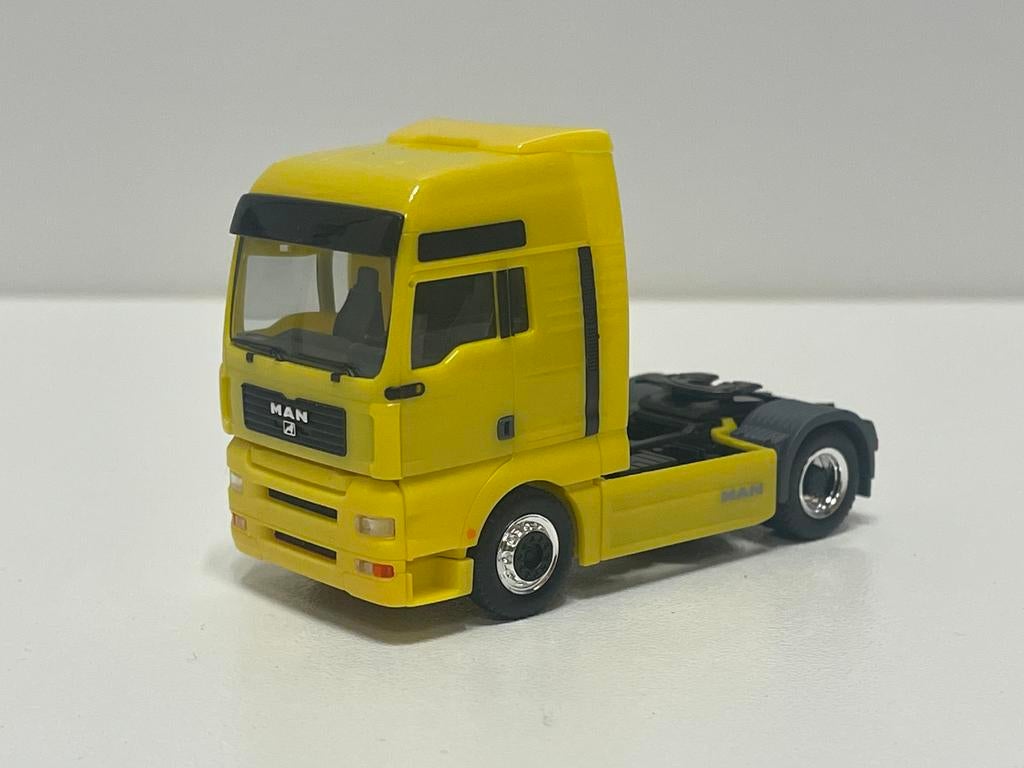 Herpa MAN TG 460 A XXL trekker geel 1/87, Ophalen of Verzenden, Zo goed als nieuw, Bus of Vrachtwagen, Herpa