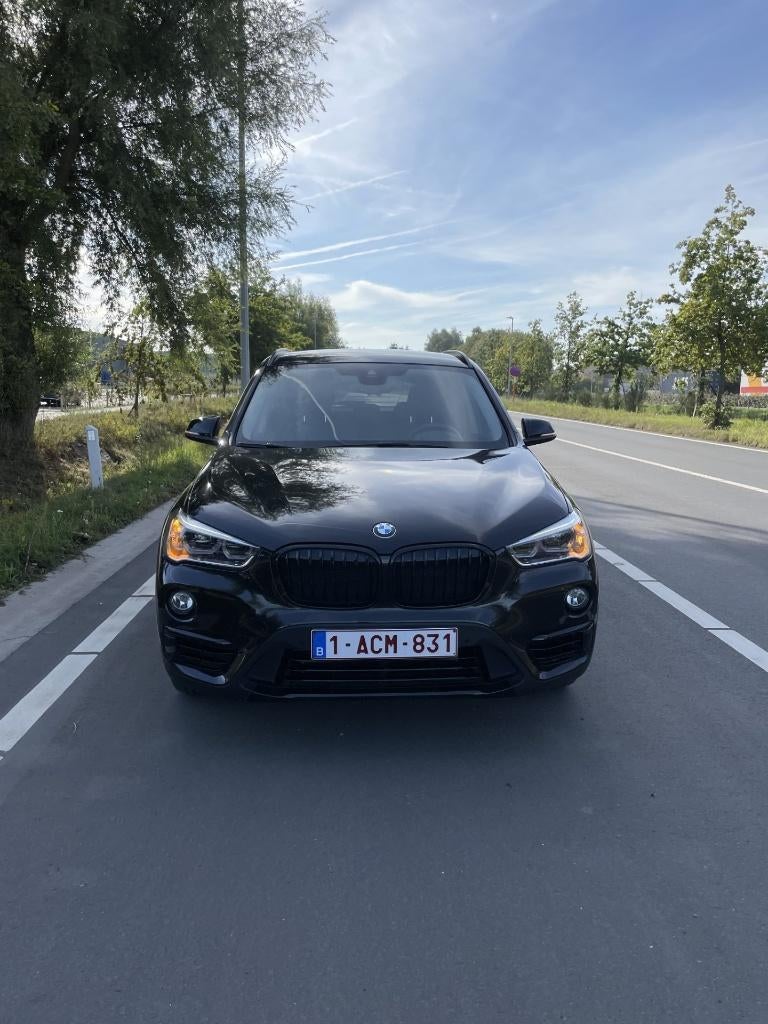BMW X1 dashcam/sportpakket/automaat/velgen 19''/71000 km, Stof, Euro 6, Zwart, 5 zetels
