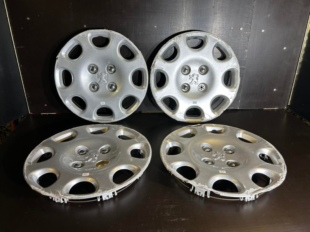 4 originele Peugeot 206 207 partner 14" wieldoppen, Ophalen of Verzenden, Gebruikt
