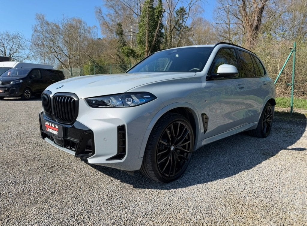 BMW X5 xDrive 3.0d // M Sport // Pano // Luchtvering // H&K, Auto's, Automaat, 2993 cc, Parkeerassistent, Leder