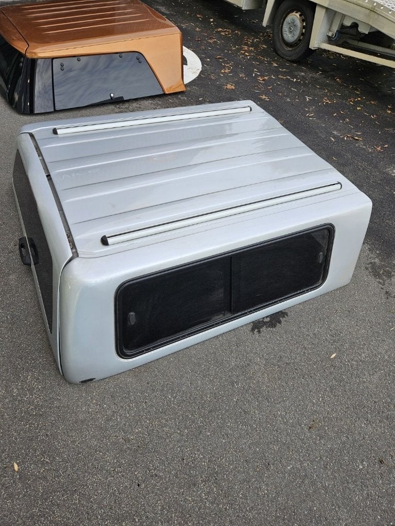 Nissan Navara à toit rigide — (D40, cabine king size), Enlèvement
