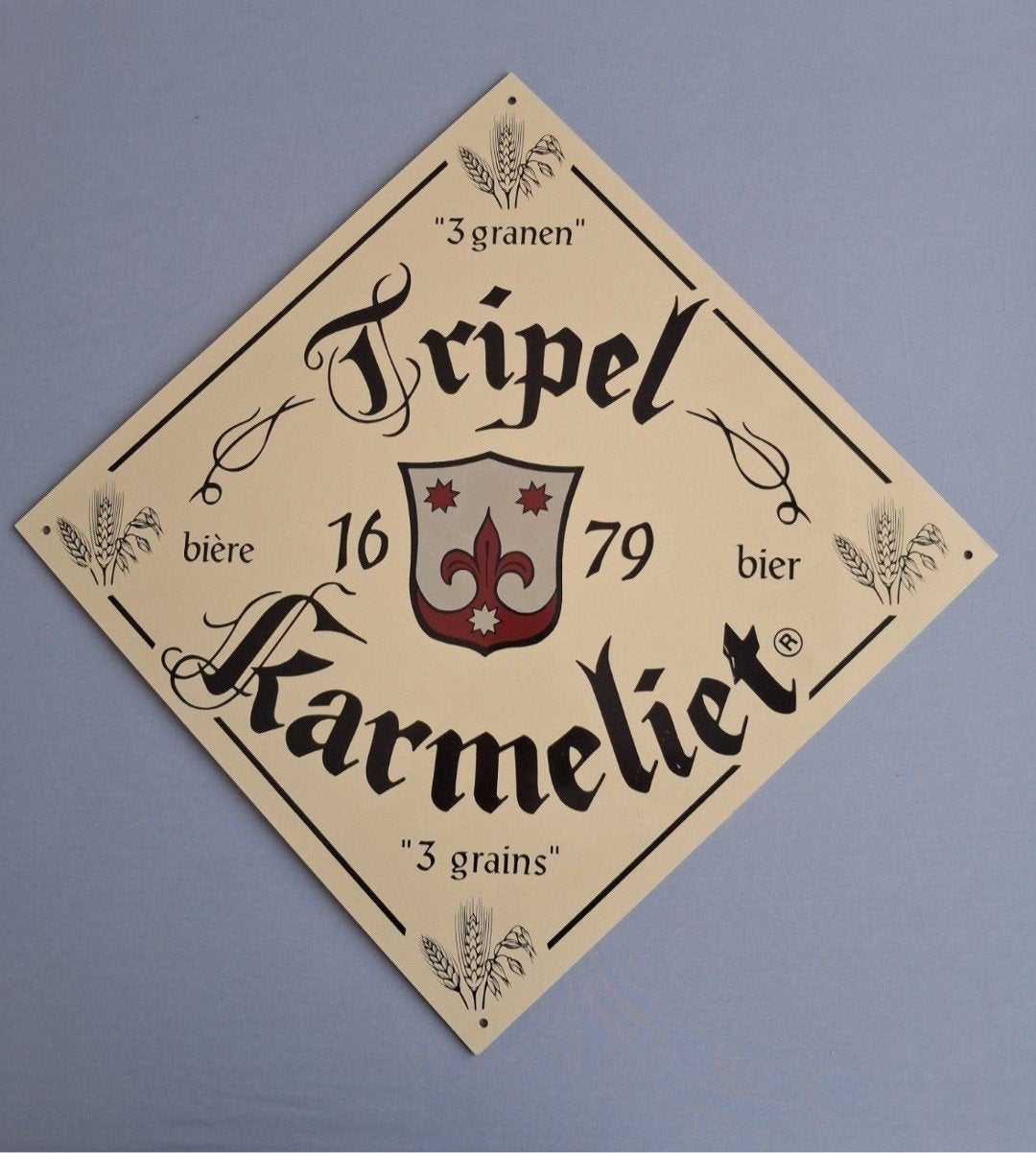 Te koop  bord  Tripel karmeliet ., Enlèvement