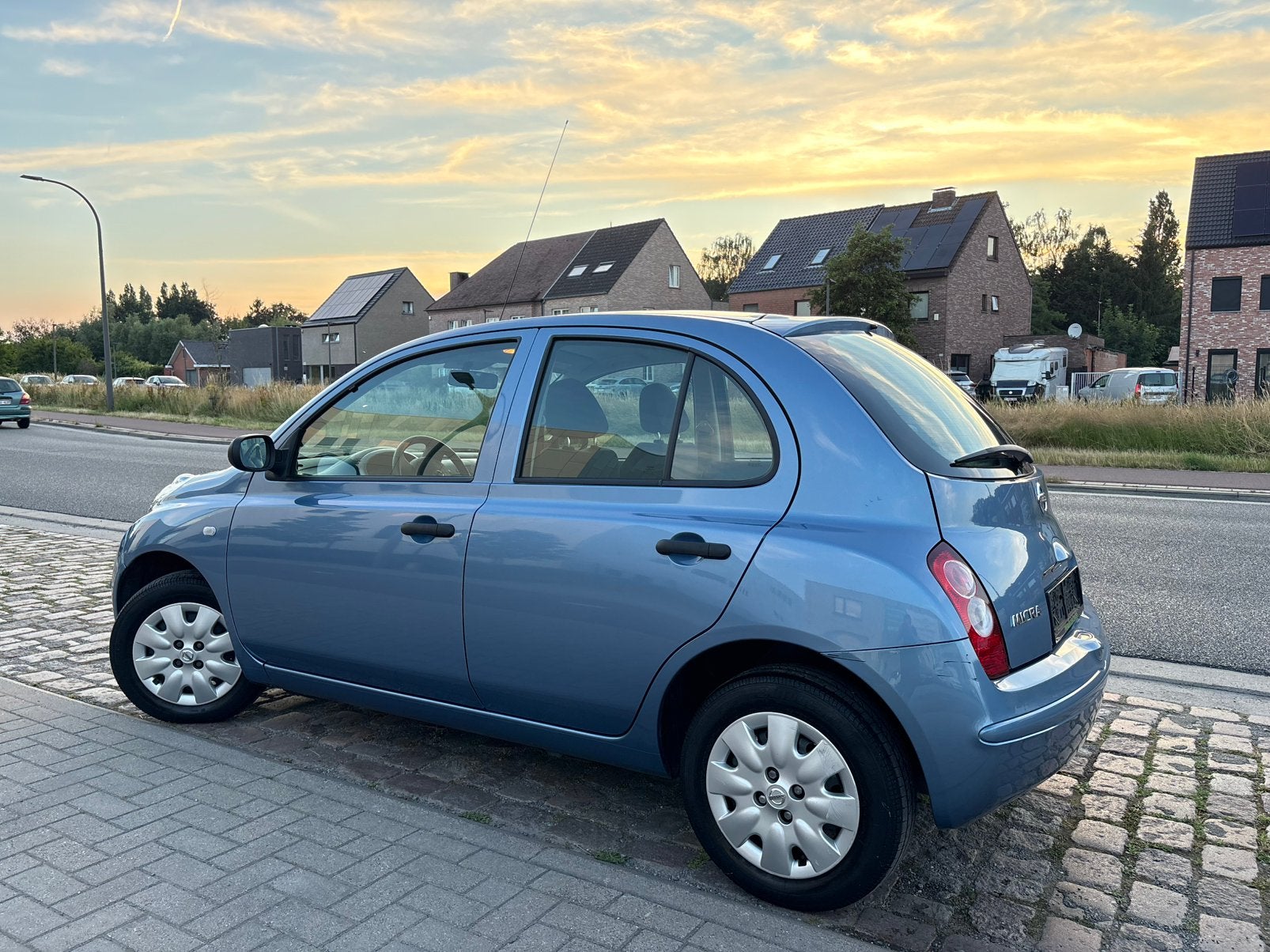 Nissan Micra | 12 Maanden Garantie | 33 Dkm | Benzine | 2005, Auto's, Nissan, Zwart, Blauw, https://public.car-pass.be/vhr/f513068c-3ca7-4396-b56d-13bc71609ba8